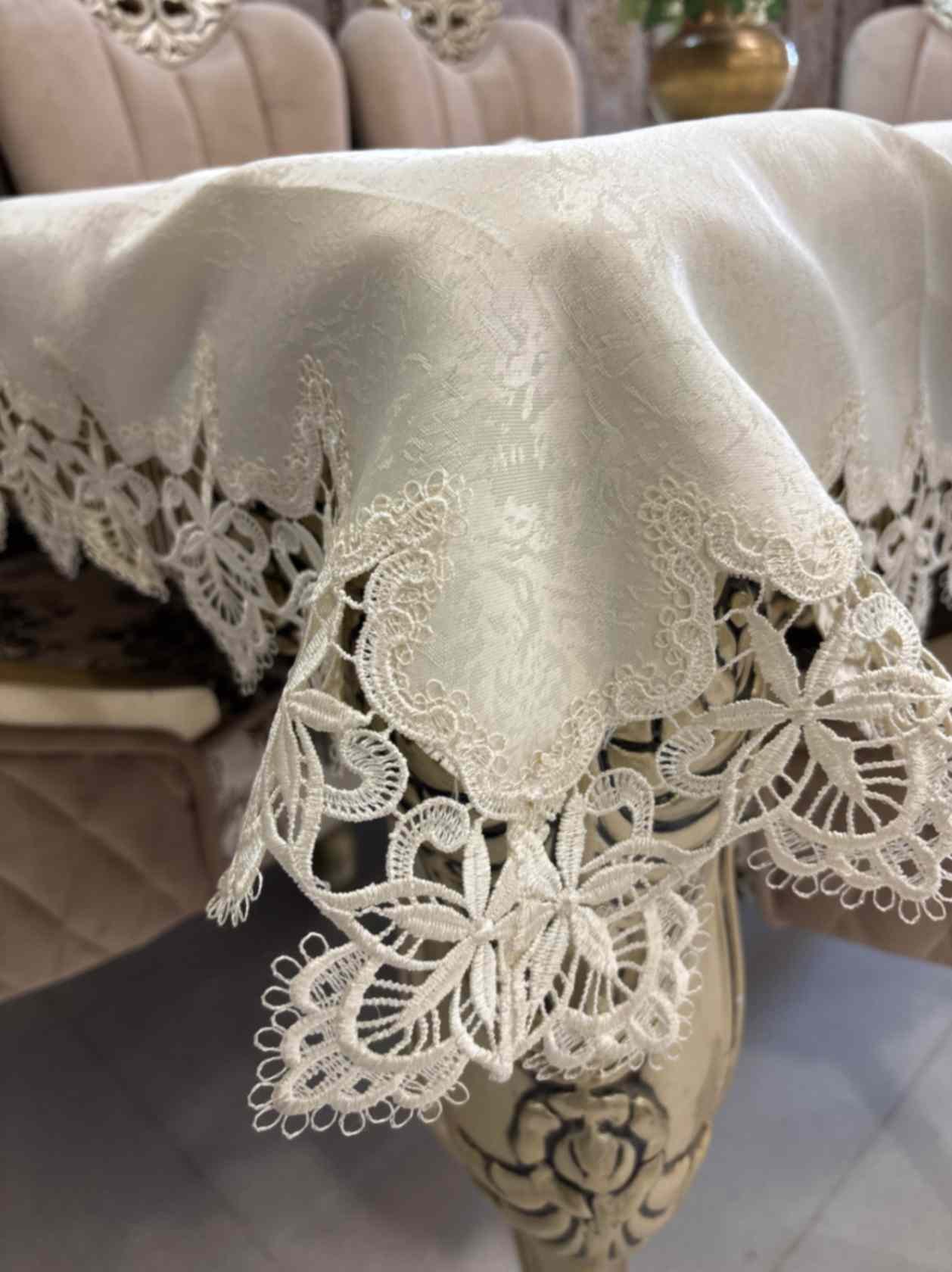 Elegant beige jacquard tablecloth with detailed floral lace edges and center design. Ideal for upscale dining, events, or daily luxury. Elegant beige jacquard tablecloth with detailed floral lace edges and center design. Ideal for upscale dining, events, or daily luxury.