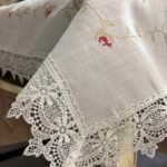 White Floral Embroidered Tablecloth with Lace Edges White Floral Embroidered Tablecloth with Lace Edges